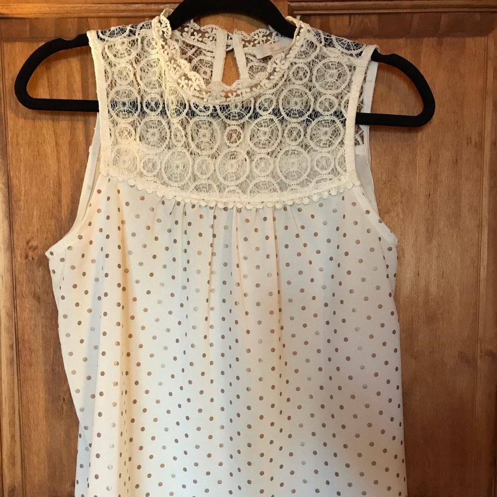 Lace top sleeveless blouse with button neck